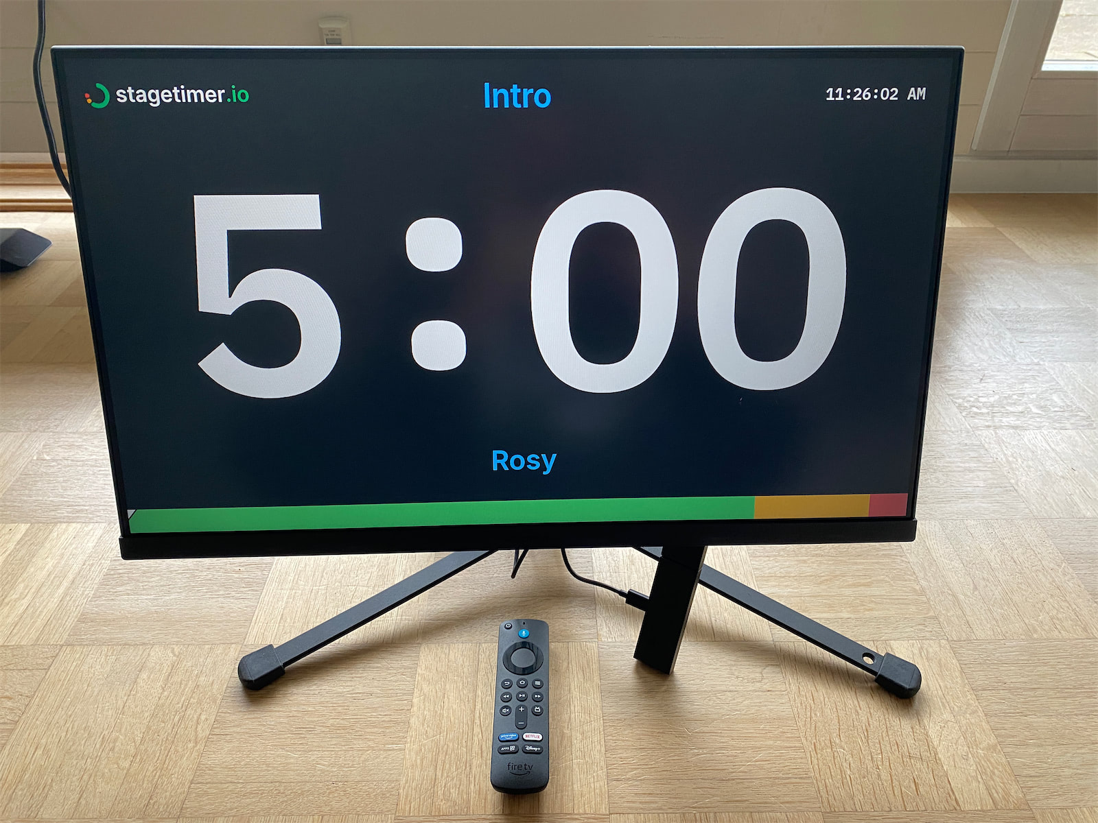 Fire TV Stick displaying a Stagetimer countdown on a TV