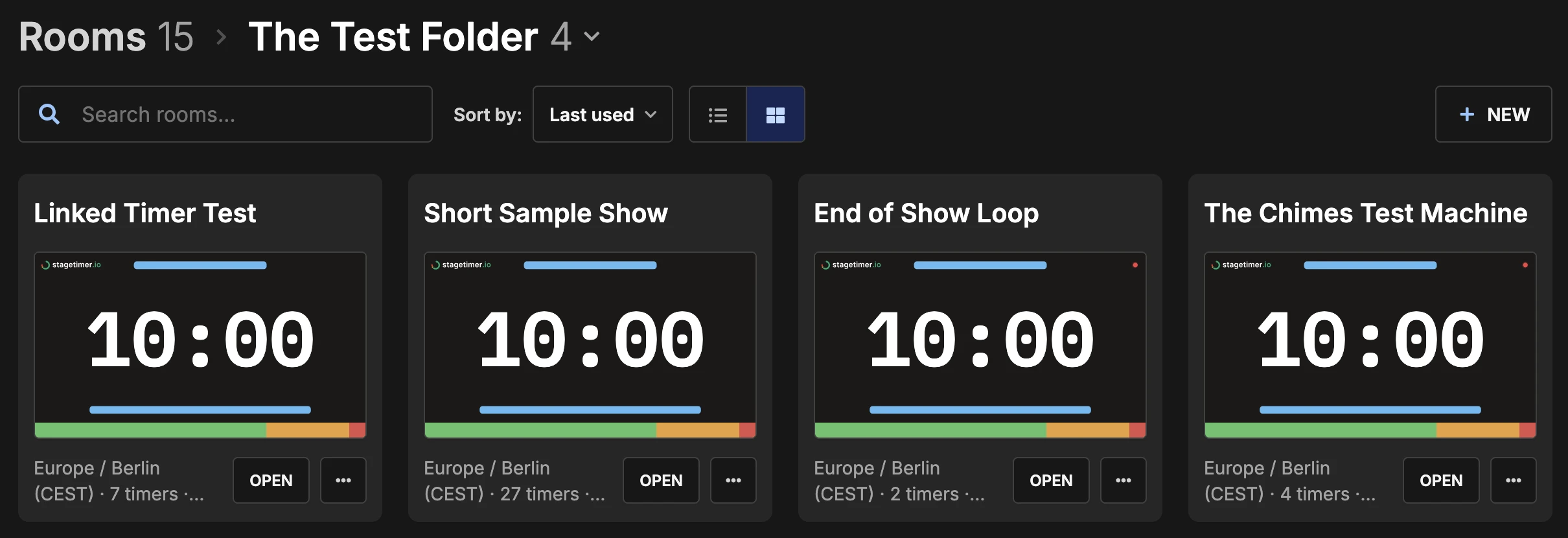 Dashboard in grid view with four room cards side by side, each with a live preview