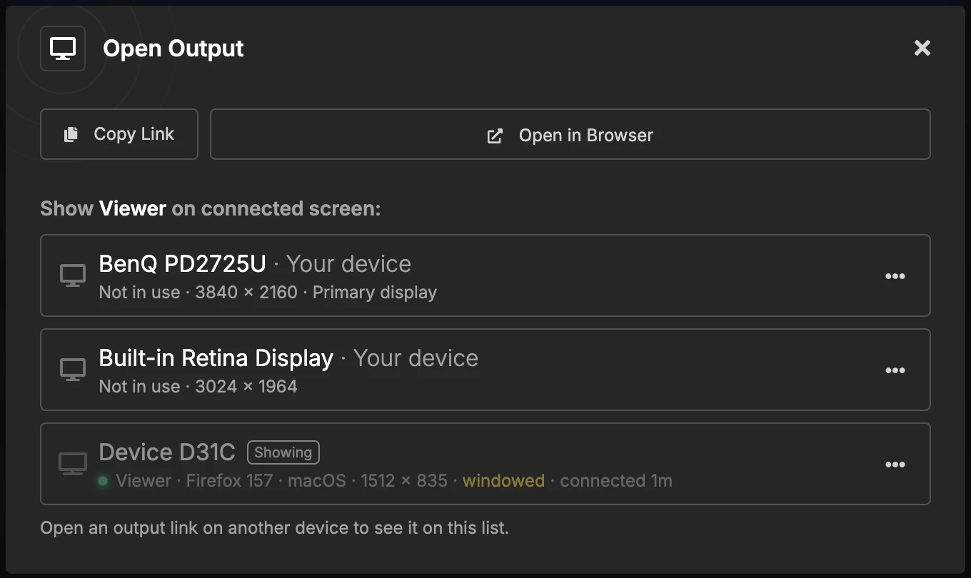 Open Output popup with Copy Link and Open in Browser buttons, and a list of two displays of this computer and one connected device marked Showing