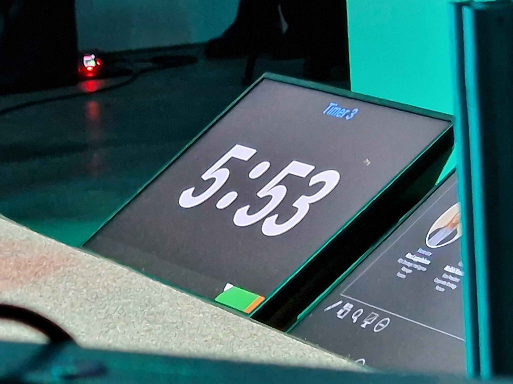 Stagetimer countdown display on a podium at Slush 2024 in Helsinki showing 5:53 remaining